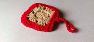 উলের কয়েন ব্যাগ