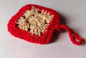 উলের কয়েন ব্যাগ